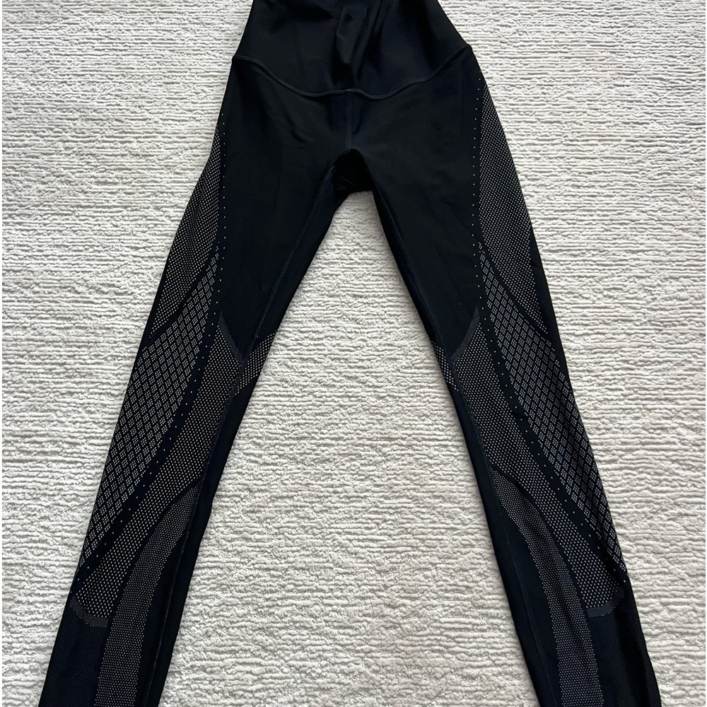 Size 2, like new,, well fitted, athletic